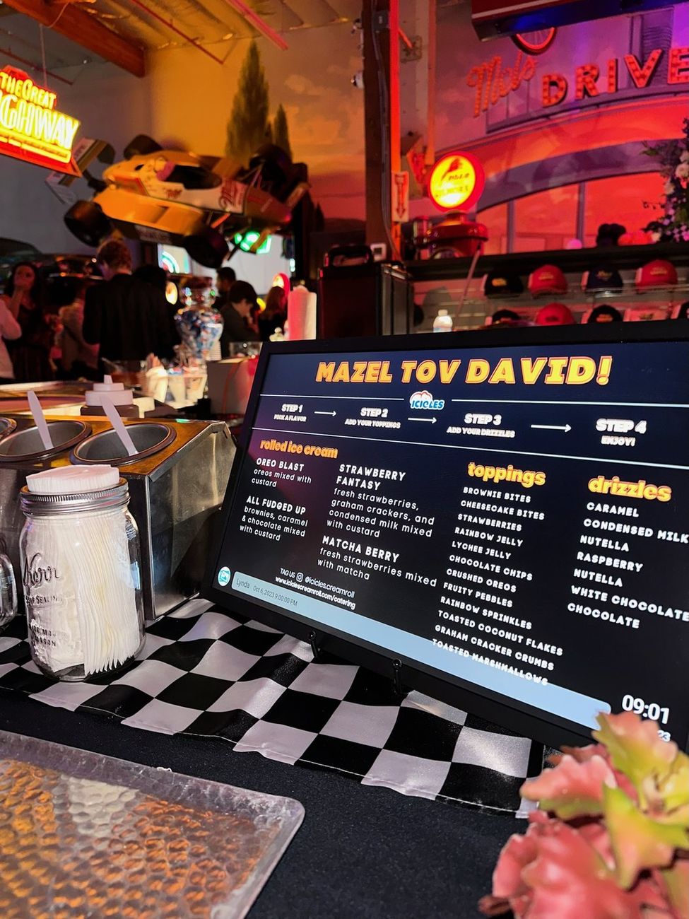 A custom Icicles menu board reading Mazel Tov David at a bar mitzvah celebration